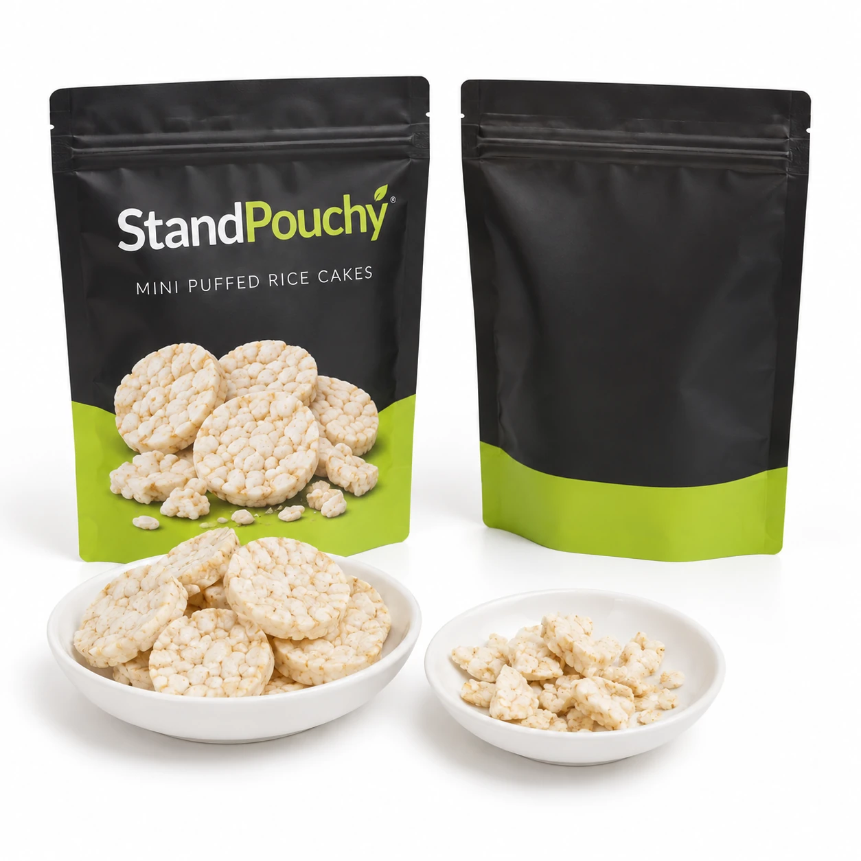 Front and blank-back mini puffed rice cake pouches beside dishes of whole discs and crumbs