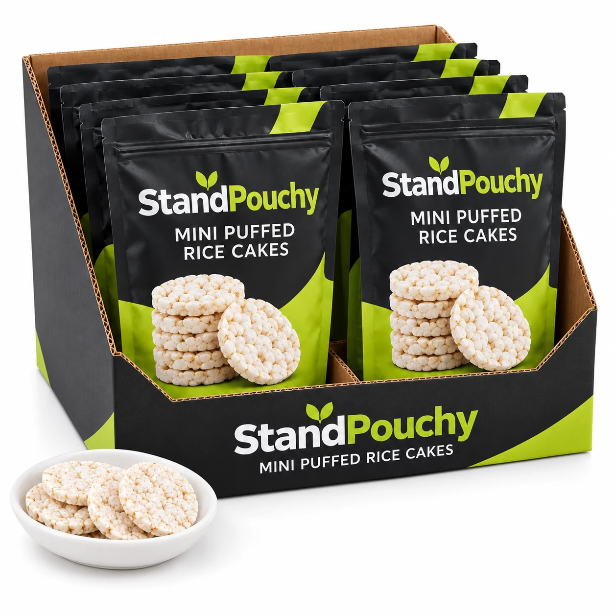 Mini puffed rice cake pouches arranged in a corrugated display case beside a dish of dry discs